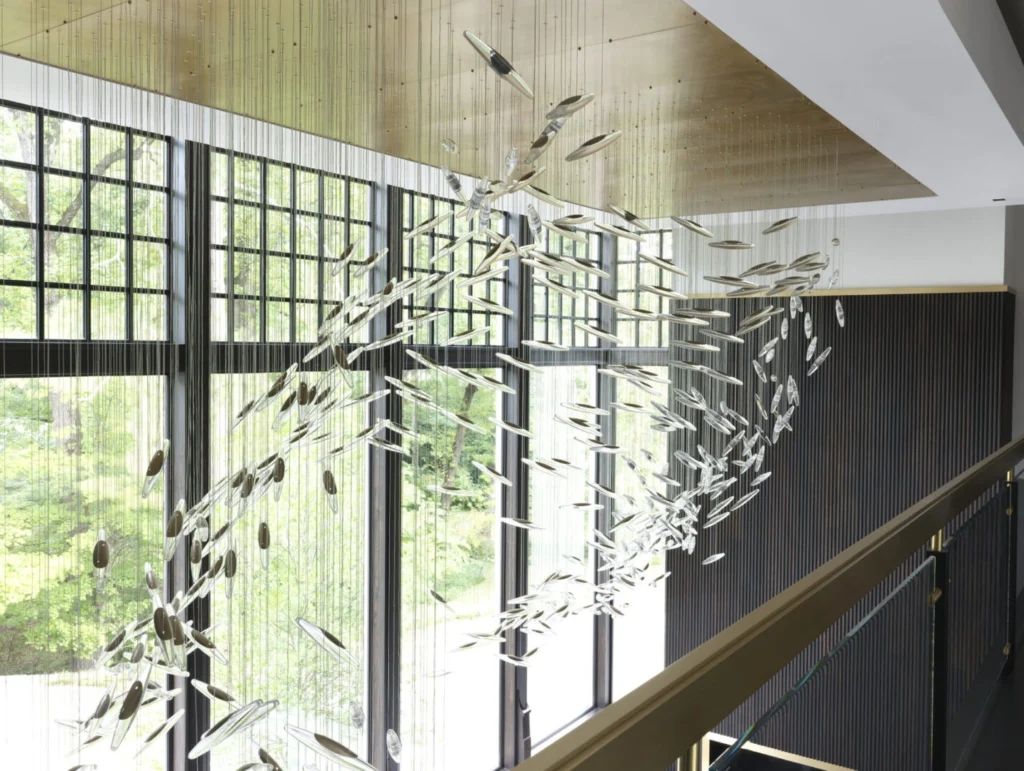 Hand-wrapped crystal light fixtures for a bespoke custom home lighting design in a modern Atlanta estate.