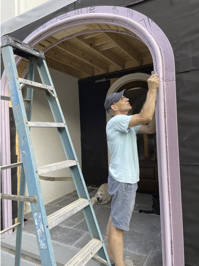 jim-sculac-atlanta-custom-home-builder Architect-Led Custom Home Building-Jim Sculac personally inspecting the architectural archway during the construction of an Alpharetta custom home.