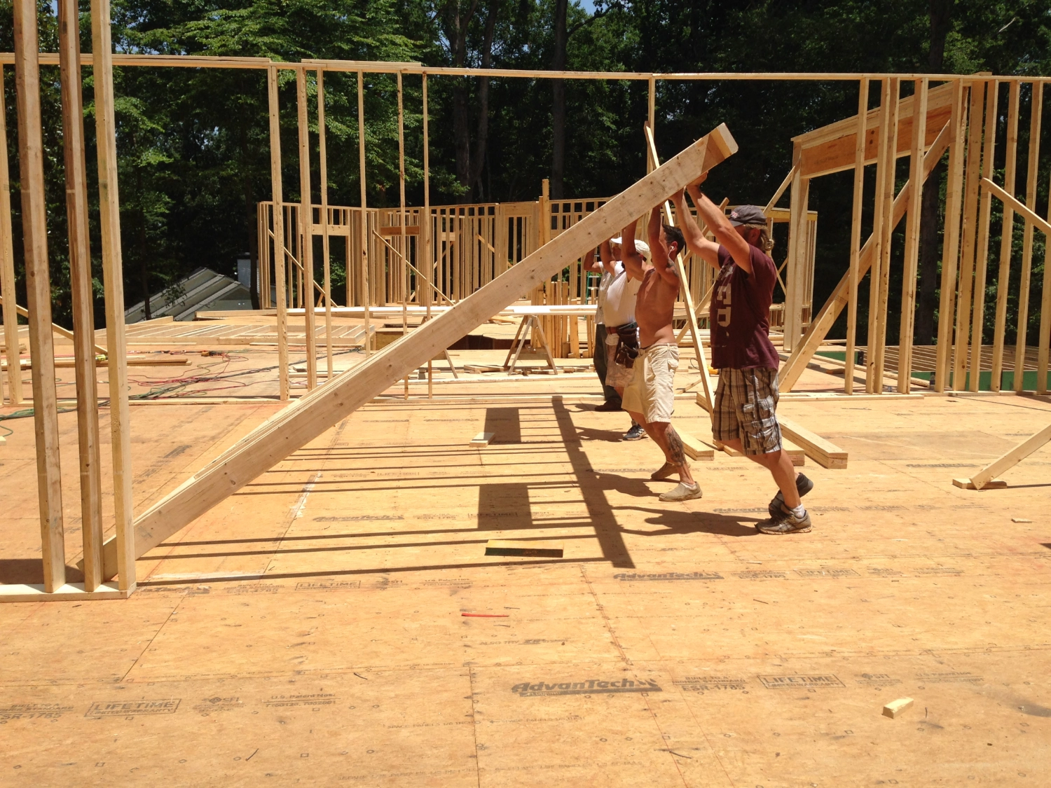 sculac-homes-the-framing-crew Architect-Led Custom Home Building Custom home construction site in Buckhead, Atlanta managed by Jim Sculac